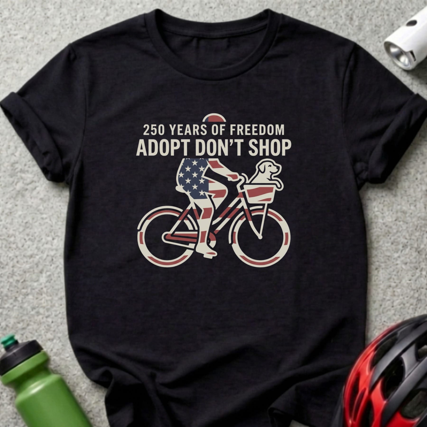 Black t-shirt with 250 Years of Freedom Adopt Don't Shop cyclist graphic.