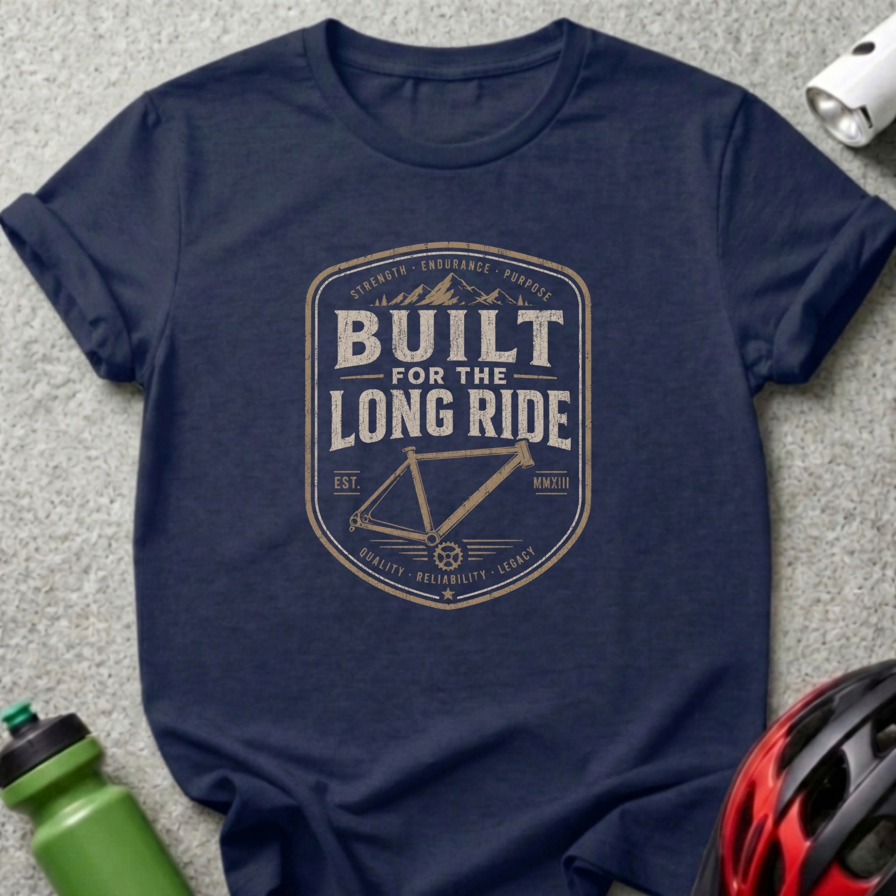 Navy t-shirt with "Built for the Long Ride" mountain and bicycle frame graphic.