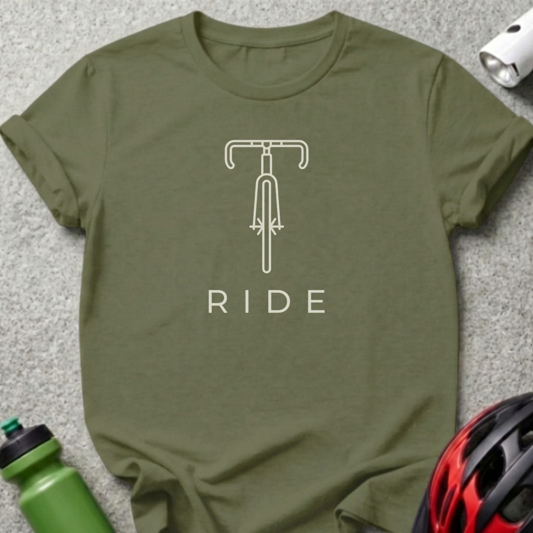 Green t-shirt with a white line drawing of a bicycle and the word "RIDE".