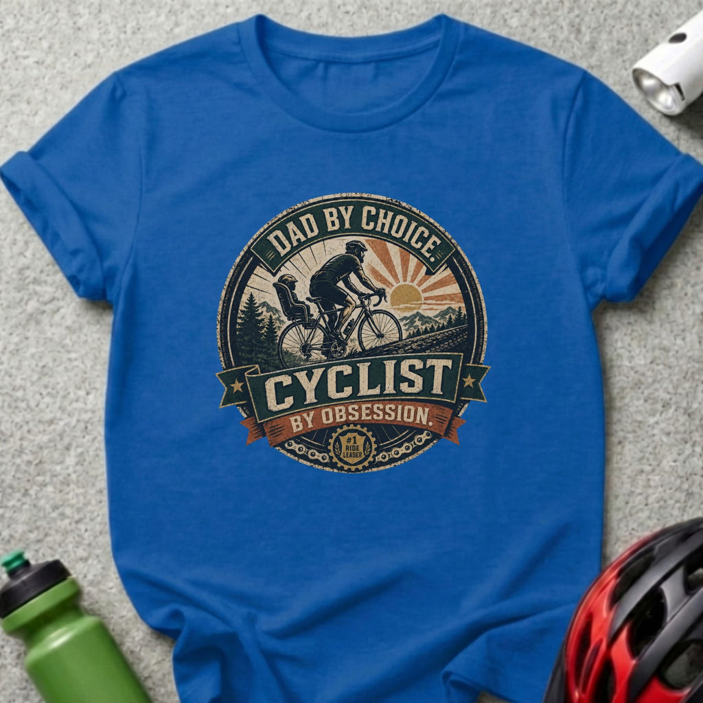 Blue t-shirt with "Dad by Choice, Cyclist by Obsession" graphic.