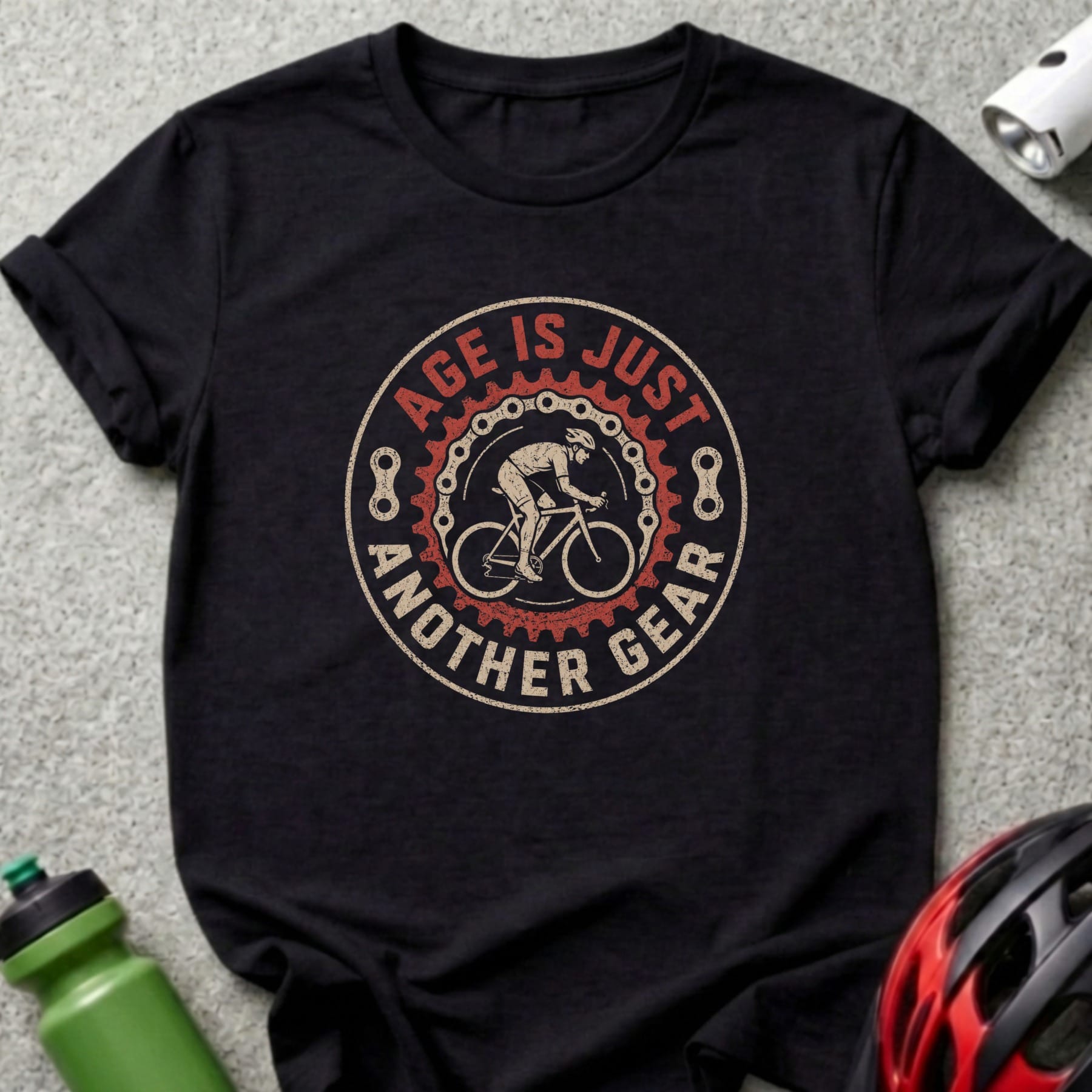 Black t-shirt with distressed graphic of cyclist, "Age is just another gear" text.