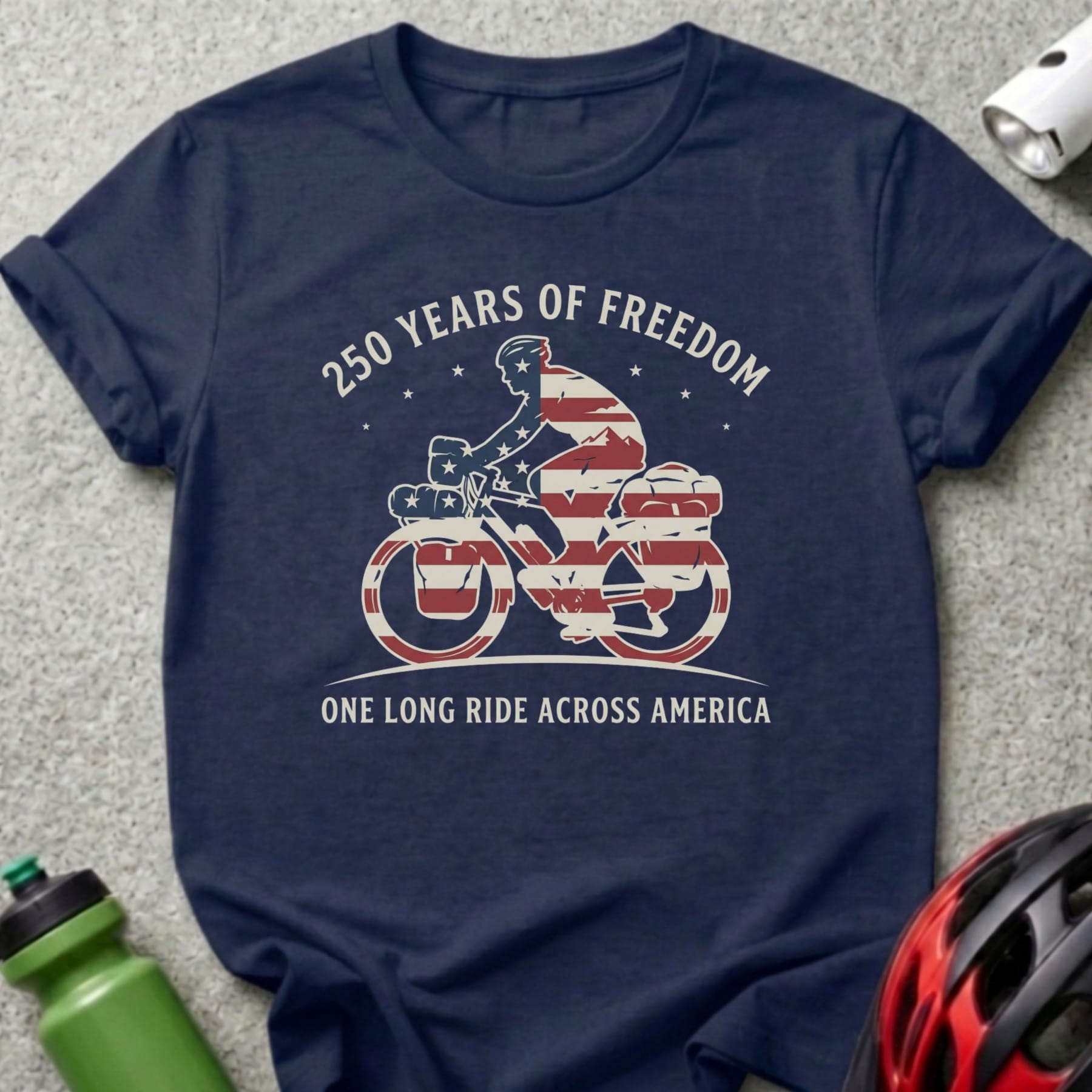 Navy t-shirt with cyclist graphic, "250 Years of Freedom" and "One Long Ride Across America".