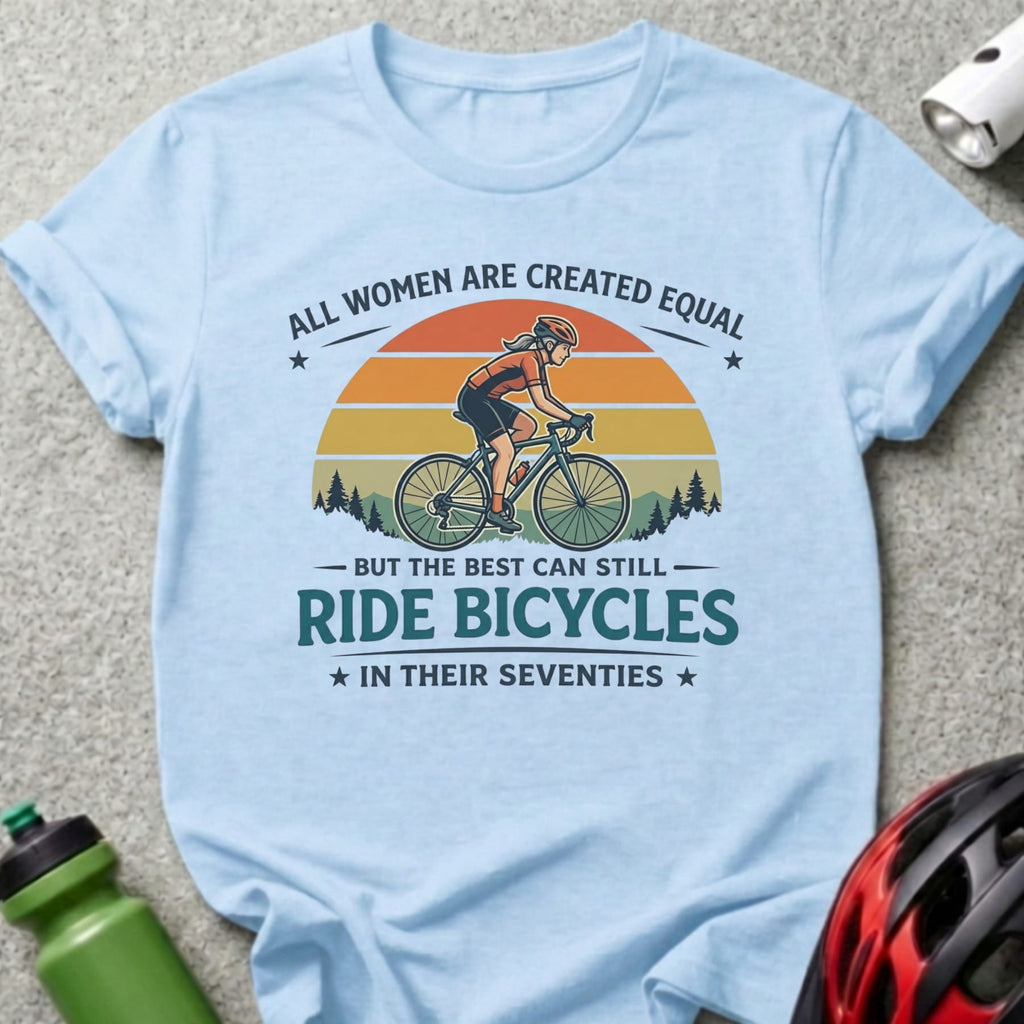 Light blue t-shirt with a vintage cycling graphic and text.