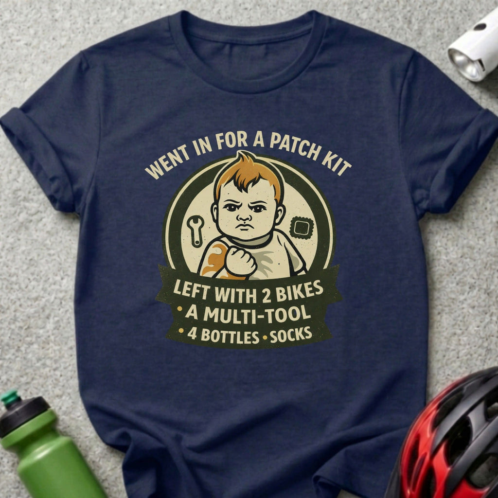 Navy t-shirt with "WENT IN FOR A PATCH KIT" and humorous cycling list.