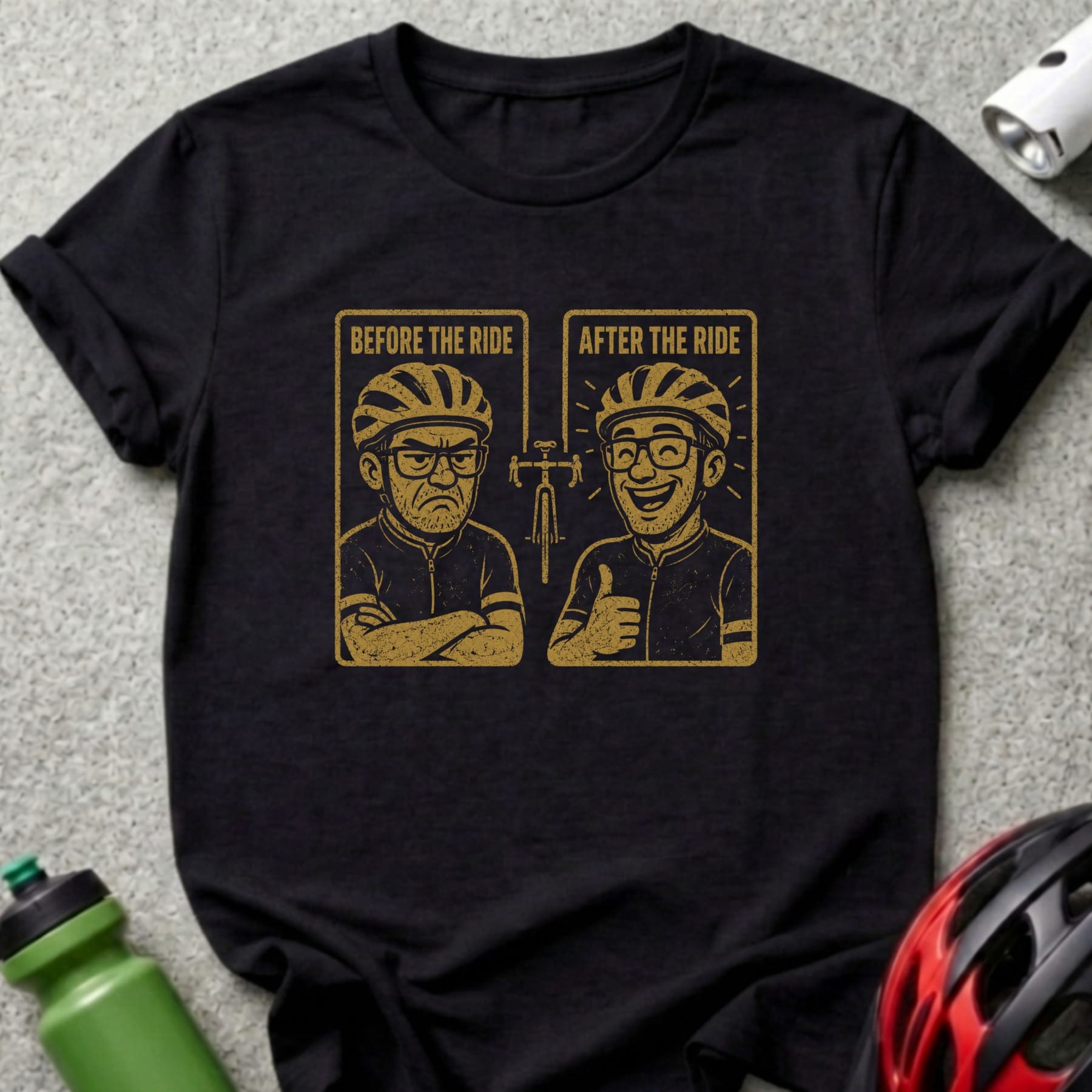Black t-shirt graphic showing grumpy cyclist before ride and happy cyclist after ride.