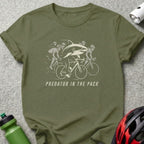 Green t-shirt with "Predator in the Pack" text and shark cycling graphic.