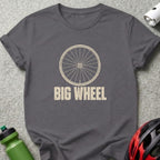 A dark gray t-shirt featuring a distressed bicycle wheel graphic and the text BIG WHEEL.
