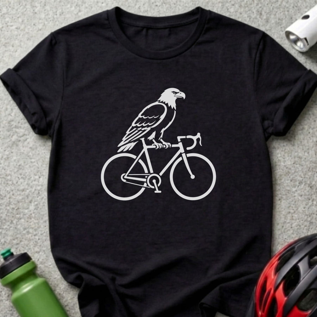 Black t-shirt with white graphic of an eagle riding a bicycle.