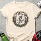 T-shirt with "Spokeswoman" logo featuring a cyclist and gear motif.