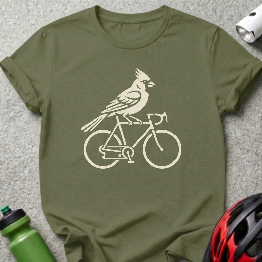 Bird riding a bicycle graphic on a green t-shirt.