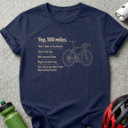 T-shirt with text about cycling 100 miles and bicycle graphic.