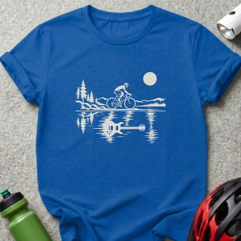 Blue t-shirt featuring a white graphic of a cyclist by a lake, reflecting an electric guitar.