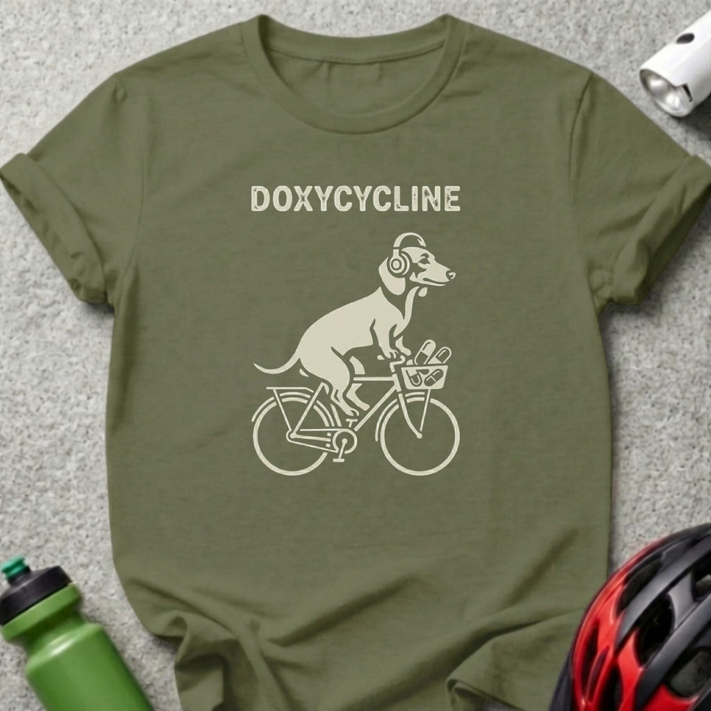 Doxycycline text above a dachshund wearing headphones riding a bicycle.