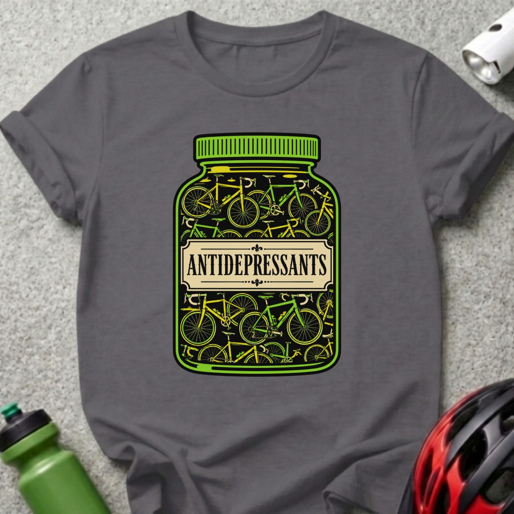 Dark grey t-shirt featuring a pill bottle filled with bicycles, labeled "ANTIDEPRESSANTS".