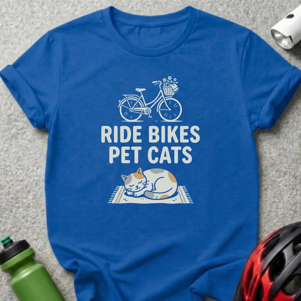 Blue t-shirt with "Ride Bikes Pet Cats" text and bicycle and sleeping cat graphic.