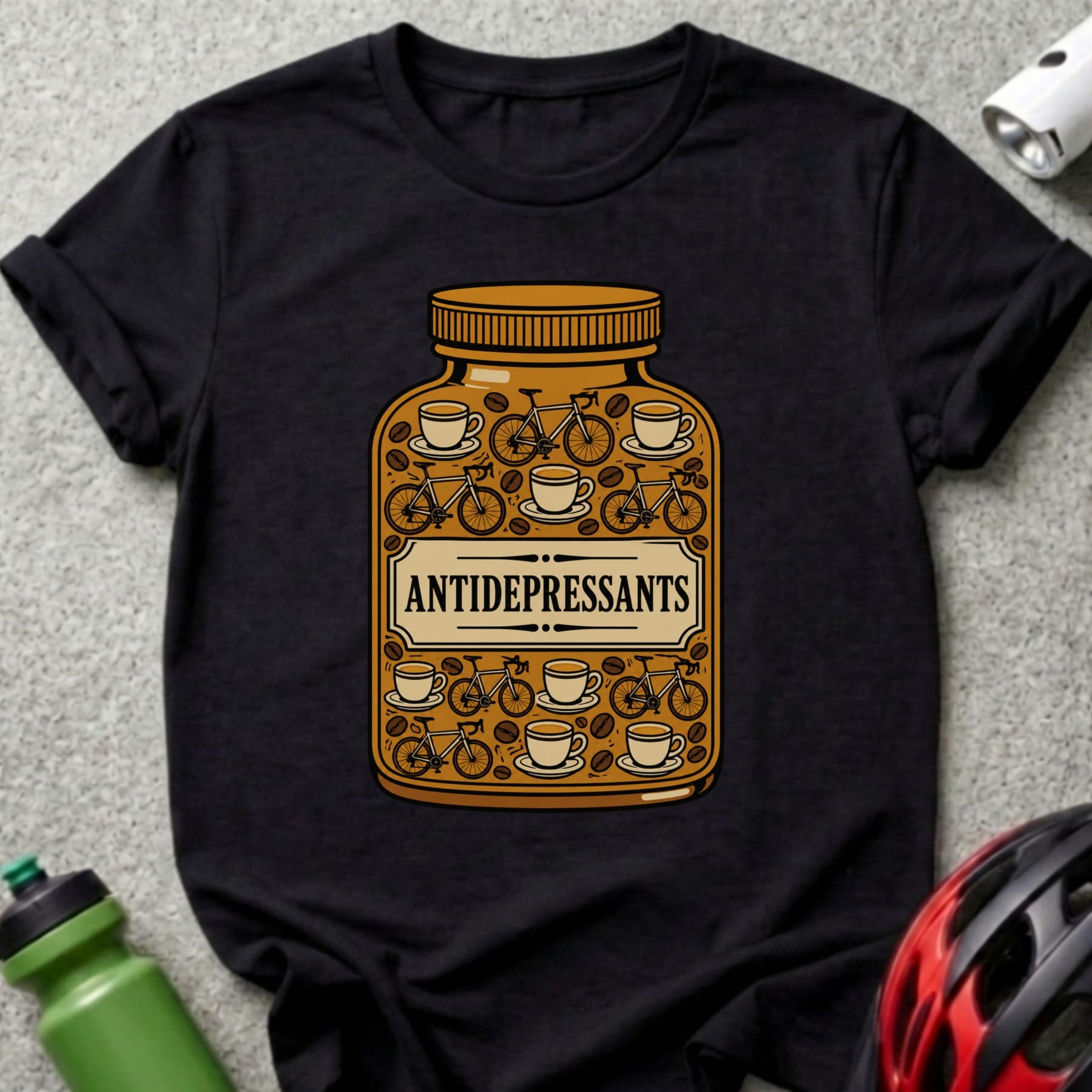 Black t-shirt with a pill bottle labeled "ANTIDEPRESSANTS" filled with coffee cups and bicycles.