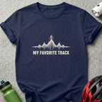 Navy blue t-shirt featuring a soundwave graphic shaped like mountains, a cyclist, and the text MY FAVORITE TRACK.
