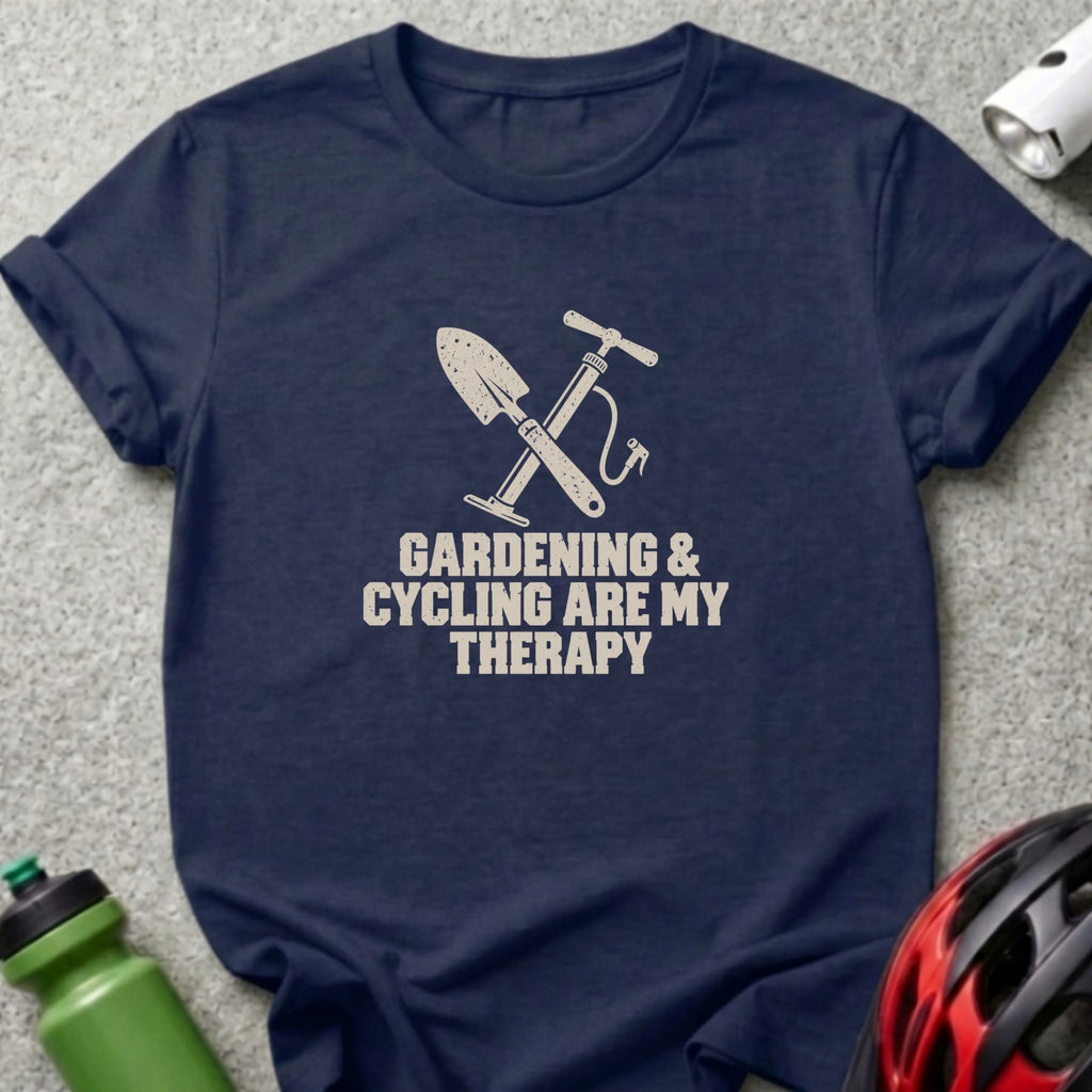 A dark blue t-shirt printed with crossed shovel and bicycle pump icons and the text Gardening and Cycling Are My Therapy.