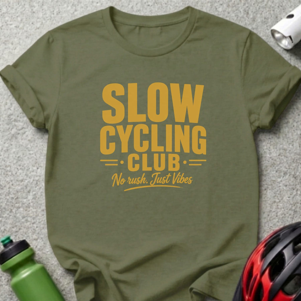Olive green t-shirt with yellow text: SLOW CYCLING CLUB. No rush. Just Vibes.