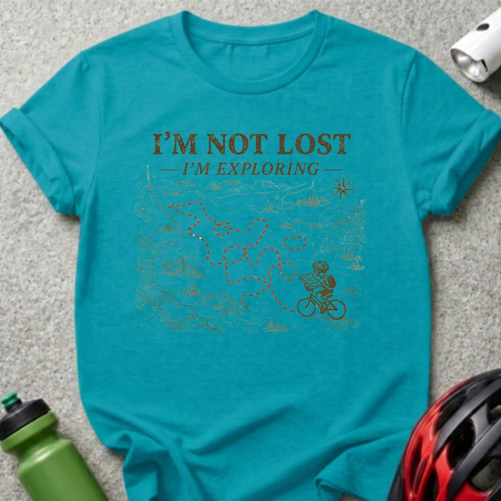 Teal t-shirt with "I'm not lost I'm exploring" text and bicyclist exploring a map.