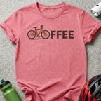 Pink t-shirt with a bicycle graphic and the word "OFFEE".