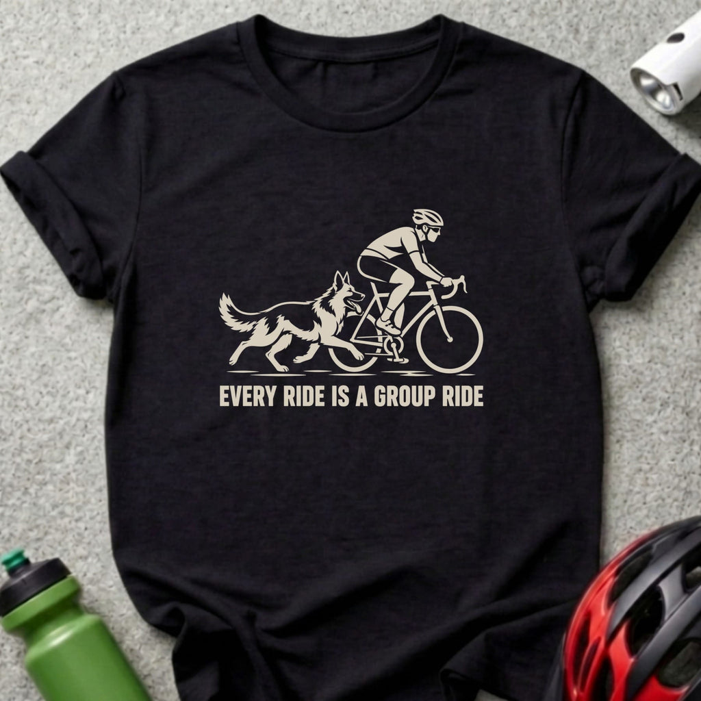 A black crew neck t-shirt featuring a graphic of a cyclist riding with a dog and the text every ride is a group ride.