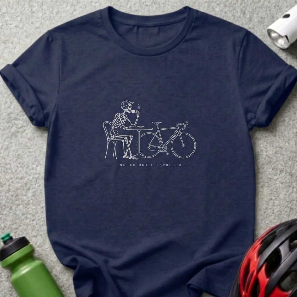 Skeleton sitting at a table with a bike and coffee, text reads Undead Until Espresso.