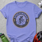 T-shirt featuring a "Spokeswoman" circular logo with a cyclist silhouette.