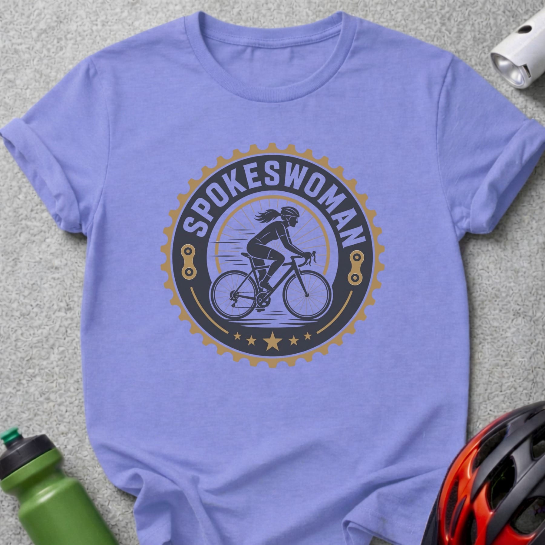 T-shirt featuring a "Spokeswoman" circular logo with a cyclist silhouette.