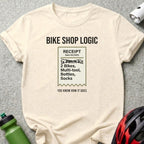 Cream t-shirt with "Bike Shop Logic" receipt graphic listing items and date.