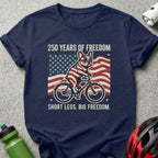 French bulldog on bicycle with American flag, "250 Years of Freedom. Short legs. Big Freedom."