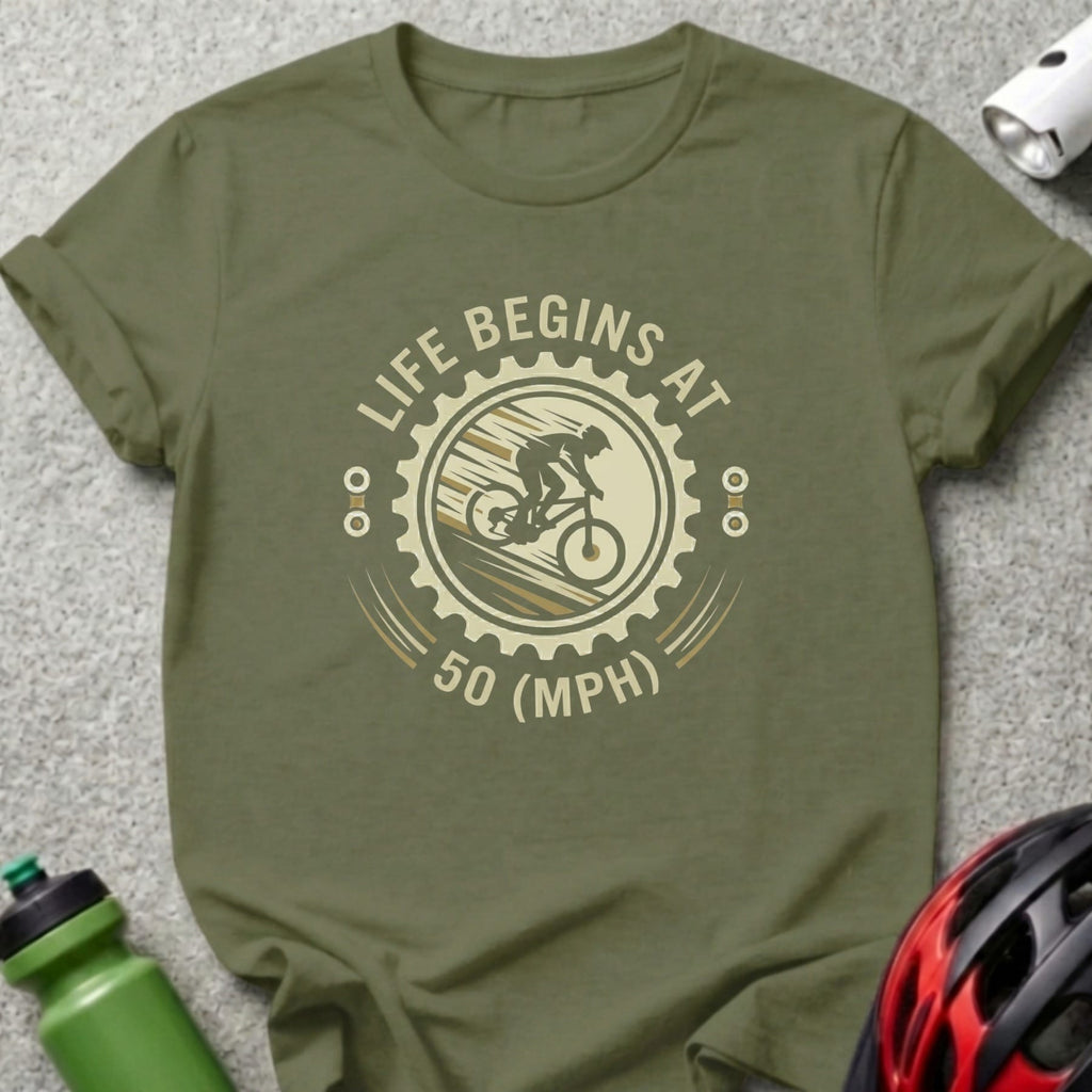 Olive green t-shirt with "Life Begins at 50 (MPH)" graphic of a cyclist.