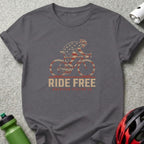 T-shirt with a cyclist silhouette featuring American flag design and "RIDE FREE" text.