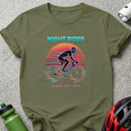 Cyclist illustration with "Night Rider Chase the Light" text on an olive t-shirt.