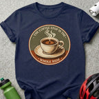 Navy t-shirt graphic of coffee cup with cyclist and "THE COFFEE STOP IS THE WHOLE RIDE" text.