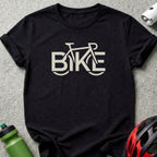 Black t-shirt with white "BIKE" text logo, bicycle silhouette integrated into the letters.