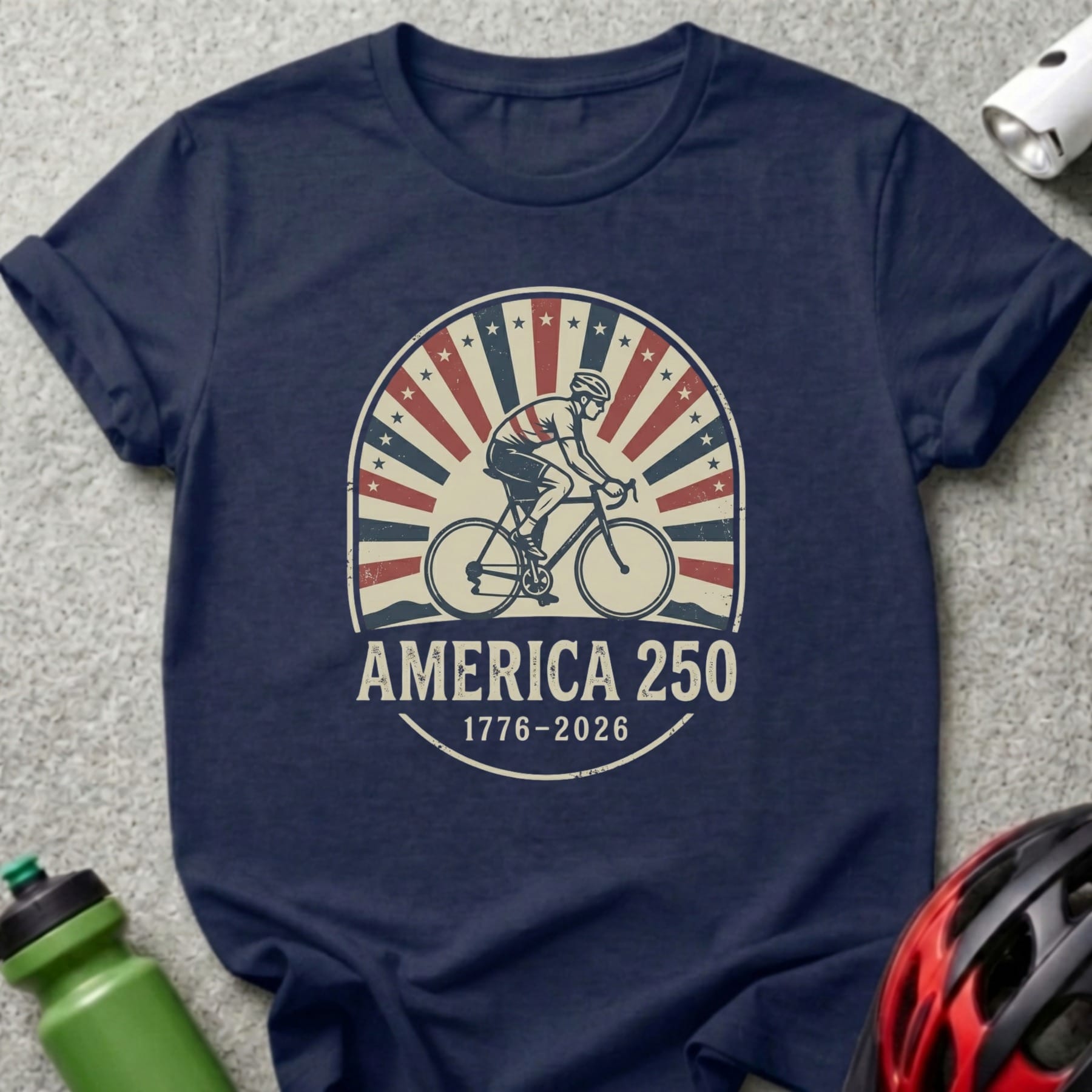 Navy t-shirt with America 250 cyclist graphic, 1776-2026.