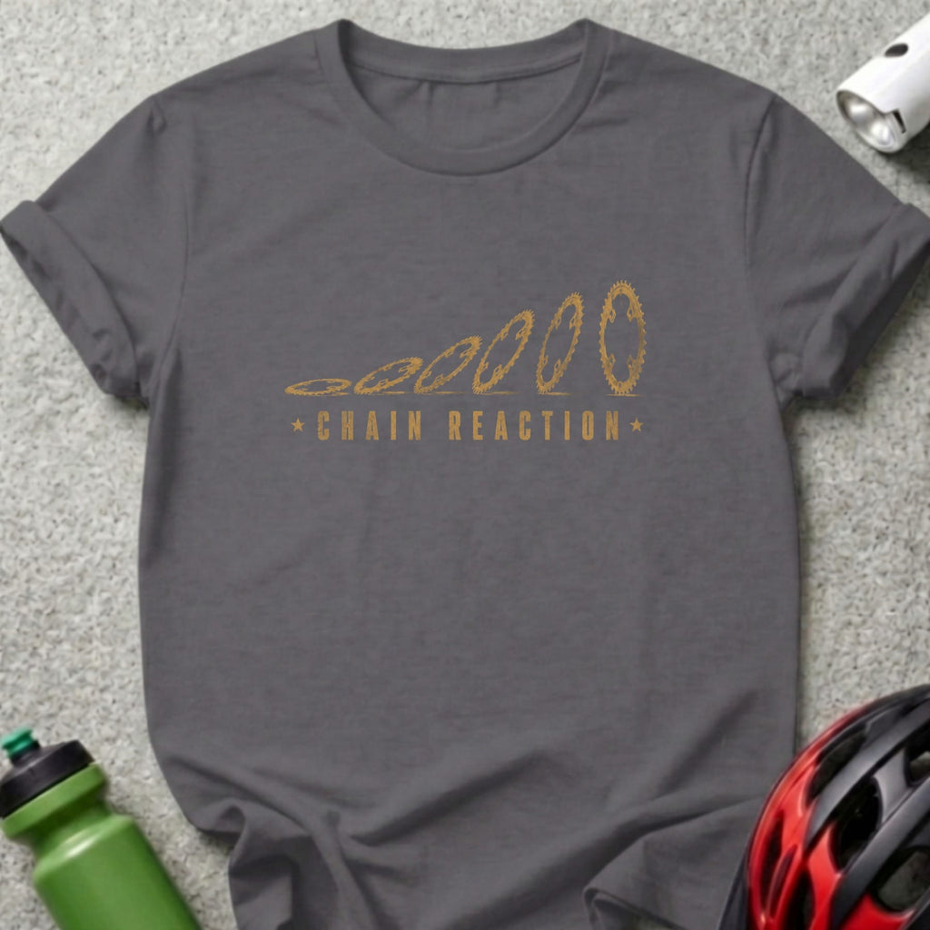 Grey t-shirt with "CHAIN REACTION" and evolving gear graphic in gold.