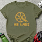Olive green t-shirt with yellow bicycle gear graphic and text "SHIFT HAPPENS".