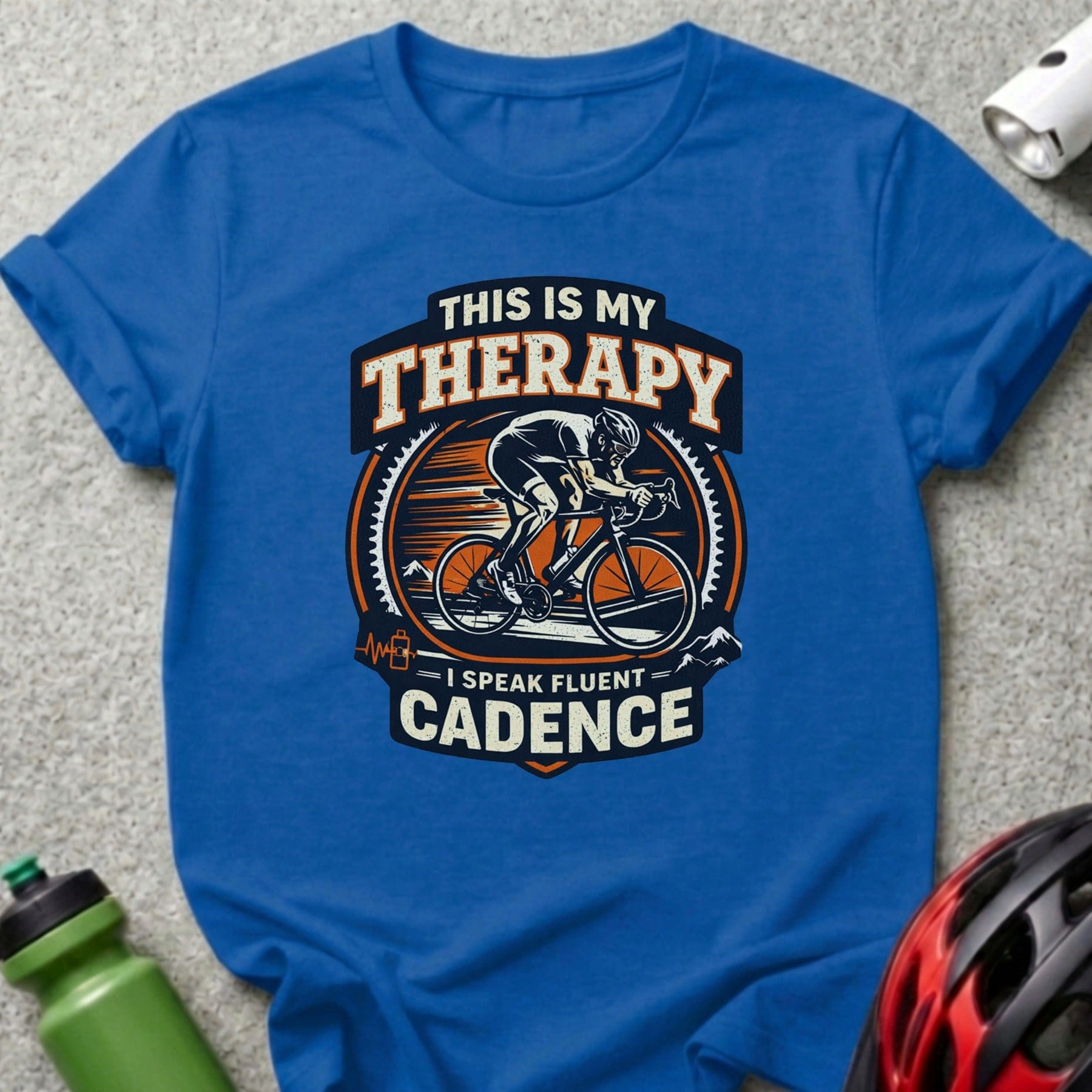 Blue t-shirt with "THIS IS MY THERAPY I SPEAK FLUENT CADENCE" and cyclist graphic.