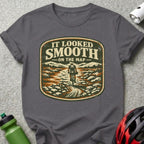T-shirt with distressed graphic of a mountain biker on a trail.