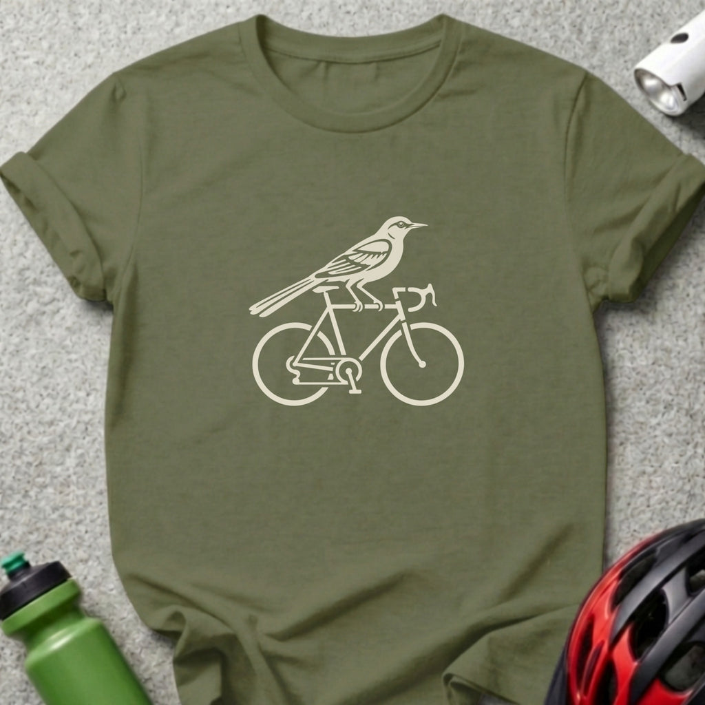 Olive green short-sleeved t-shirt featuring a cream-colored graphic of a bird perched on a bicycle.