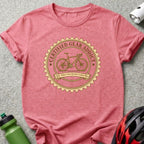 T-shirt with "Certified Gear Addict" and bike graphic.