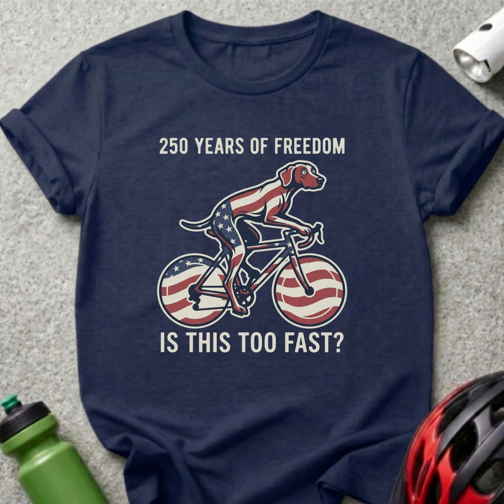 Dog on a bicycle with American flag design, "250 Years of Freedom Is This Too Fast?".
