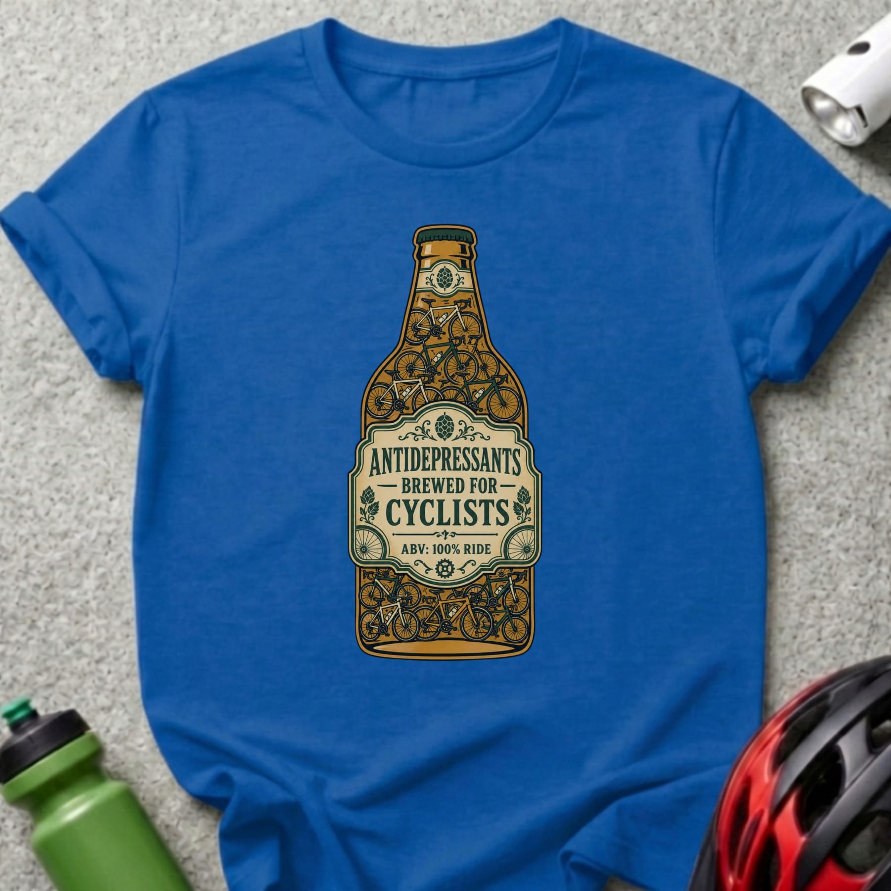 Blue t-shirt with "Antidepressants Brewed For Cyclists" beer bottle design.