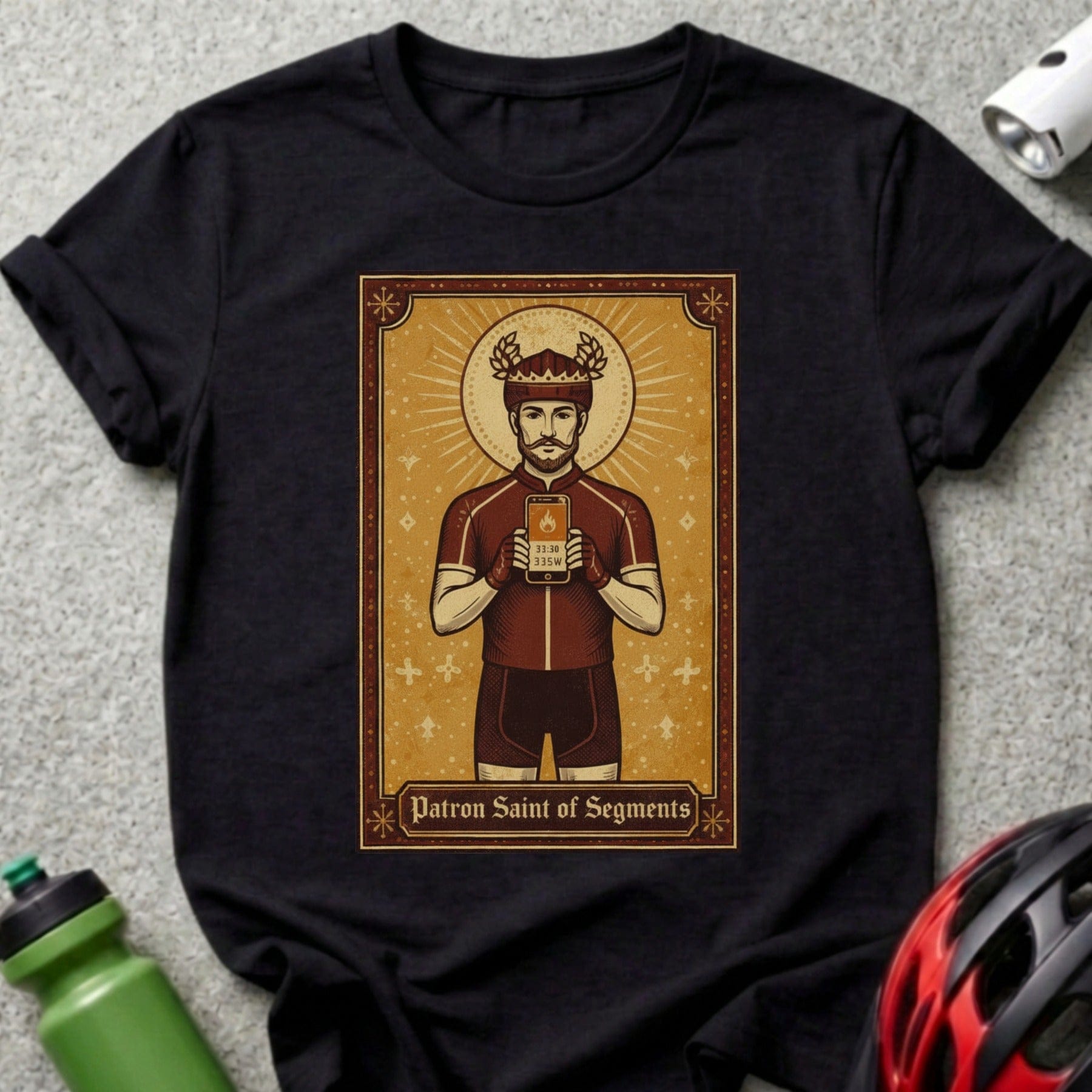 T-shirt featuring a cyclist dressed as a saint, holding a phone.