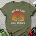 Green t-shirt with "BUY THE BIKE FIGURE IT OUT LATER" and cyclist graphic.