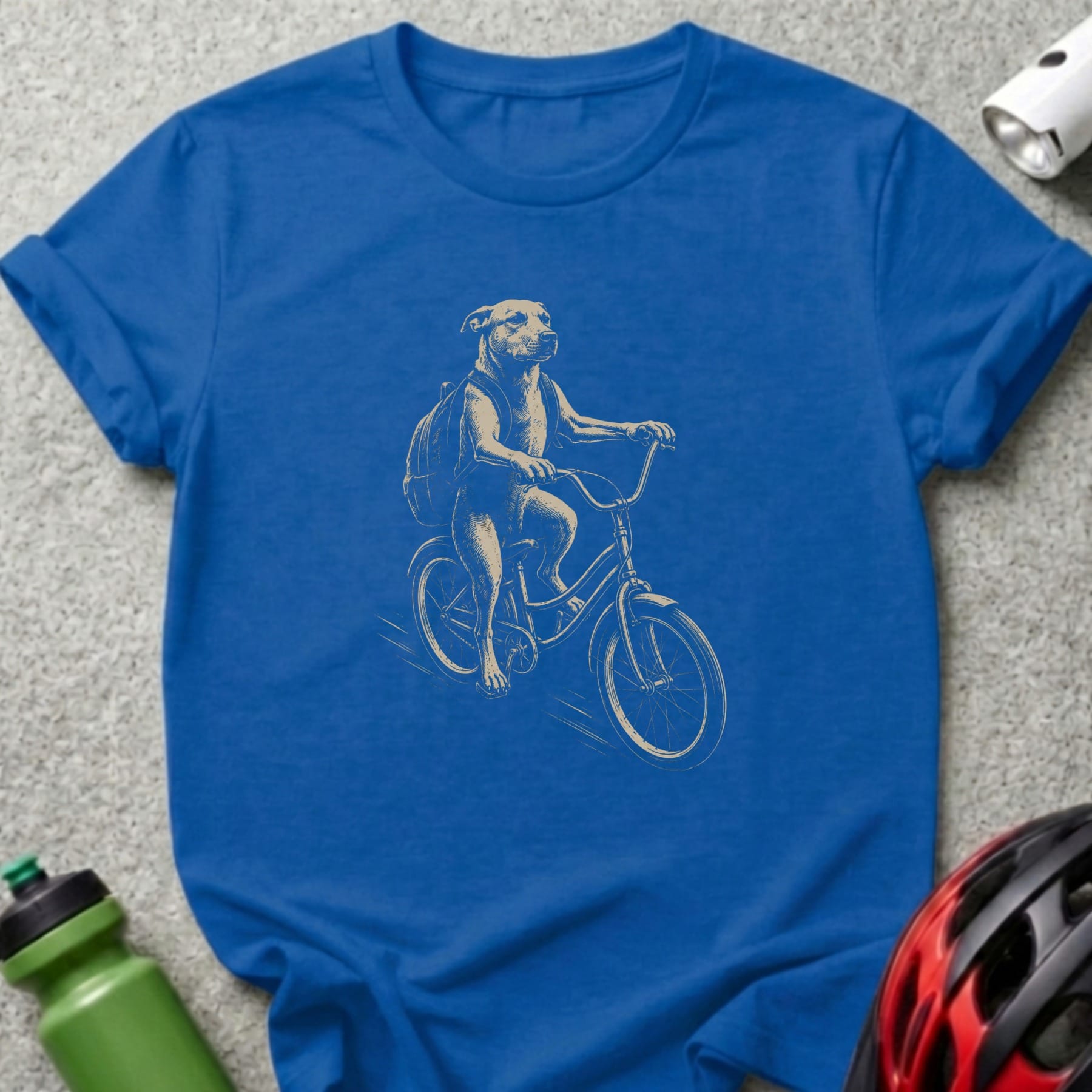 Dog wearing a backpack rides a bicycle.
