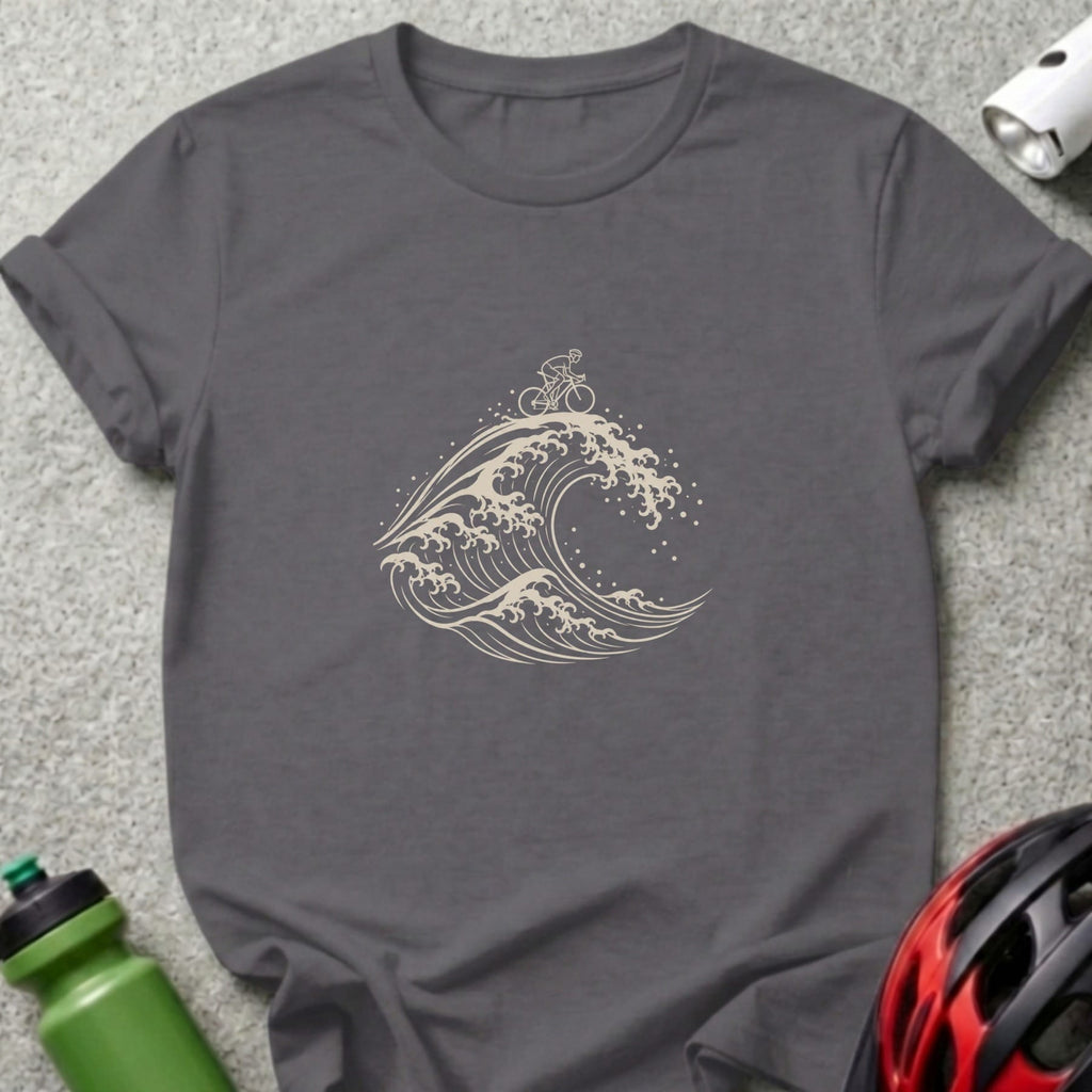 Dark gray crewneck t-shirt featuring a beige line art graphic of a cyclist riding atop a large wave.