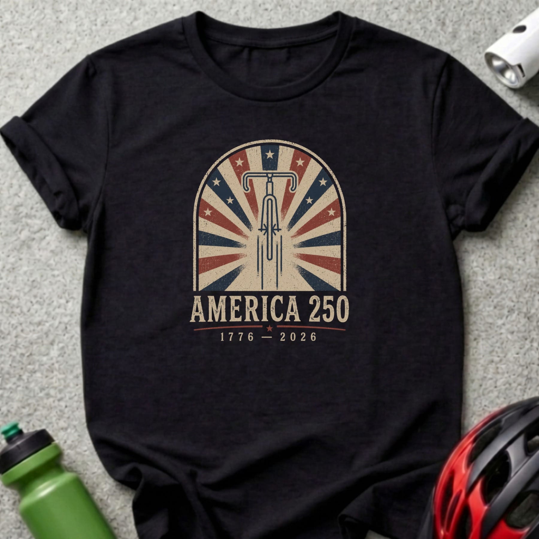 Black t-shirt with "AMERICA 250" and vintage bicycle wheel graphic.